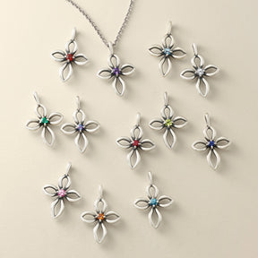 Garnet (January) | Amethyst (February) | Lab-Created Aqua Spinel (March) | Lab-Created White Sapphire (April) | Lab-Created Emerald (May) | Lab-Created Alexandrite (June) | Lab-Created Ruby (July) | Peridot (August) | Lab-Created Blue Sapphire (September) | Lab-Created Pink Sapphire (October) | Citrine (November) | Blue Zircon (December)