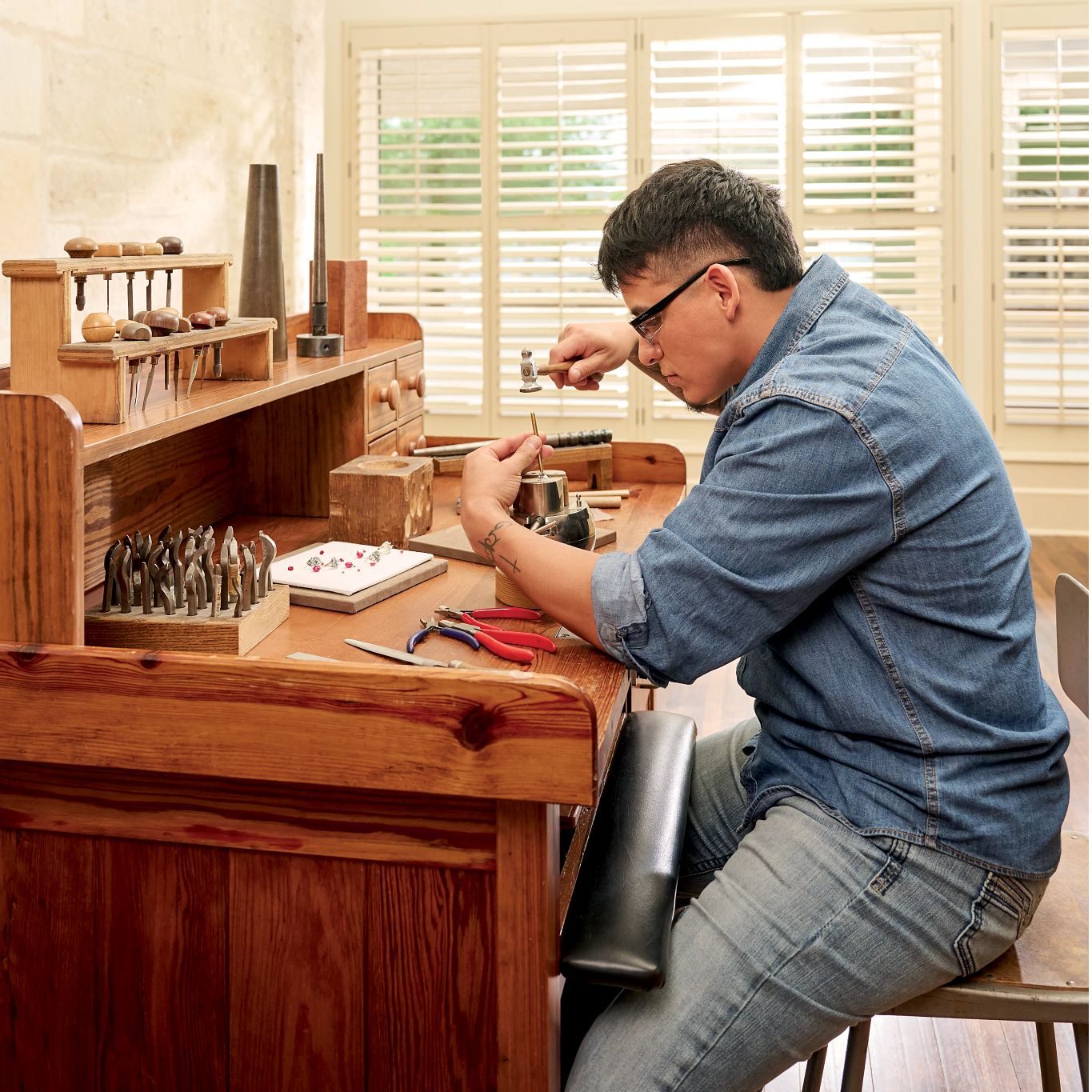 A James Avery craftsman at the bench